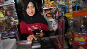A woman in a kiosk
