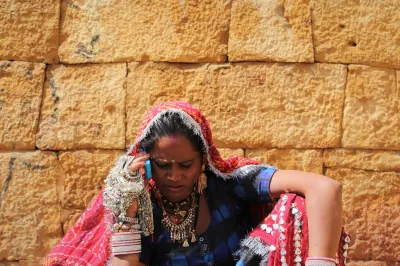 An Indian businesswoman speaks on the phone
