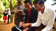 People look at a mobile device