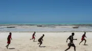 Masai boys playing football at Jambiani in Zanzibar