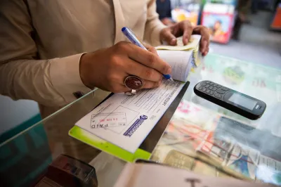 A man records a money transfer