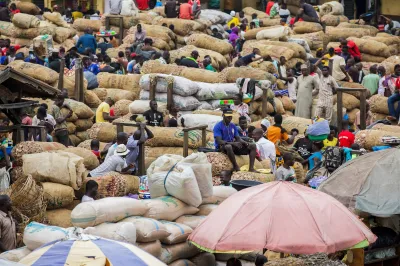 A crowd gathers at a market
