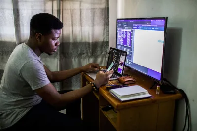 A man works at his computer